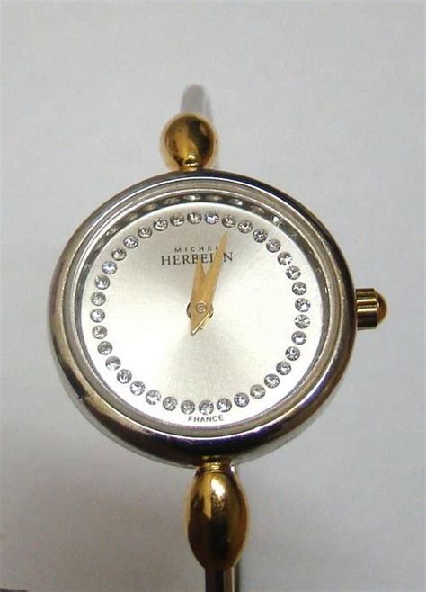 fake michel herbelin bangle watch|michel herbelin watch identification.